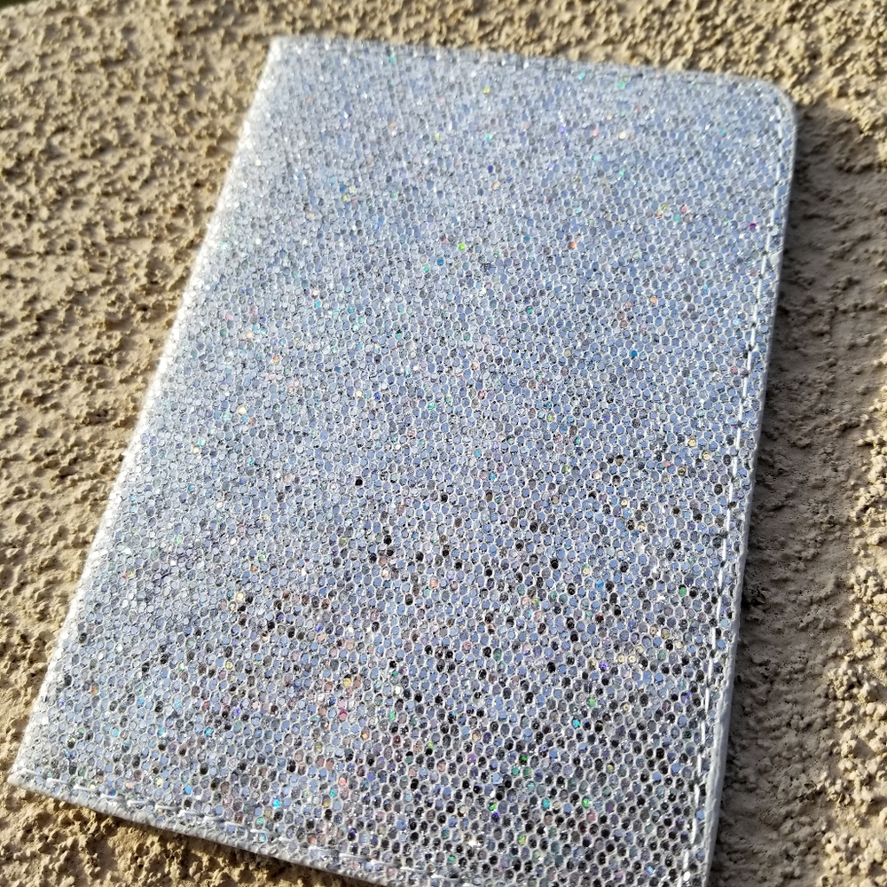 Silver glitter passport cover, never used.